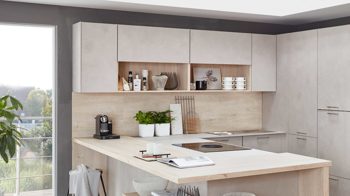 Einbauküche Nobilia® aus Holz in Holzfarben Hell nobilia® Einbauküche Riva mit JUNKER Elektrogeräten und Esstheke Beton Sand & Eiche Montreal - Stellfläche ca. 304 x 319 cm