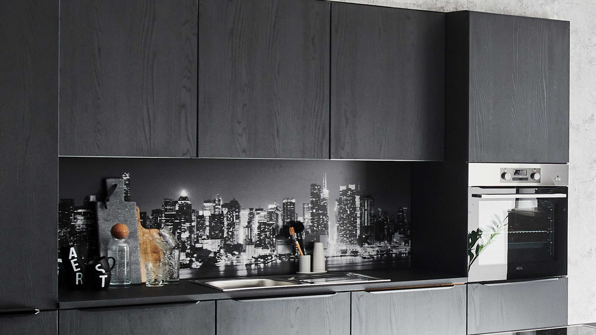 Einbauküche Nolte® küchen aus Holz in Schwarz nolte® Einbauküche Manhattan mit AEG Einbaugeräten Eiche Nero – dreizeilig