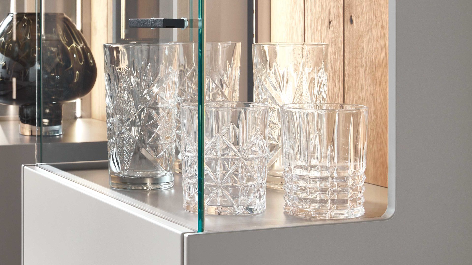 Vitrine Wöstmann markenmöbel aus Holz in Grau WÖSTMANN Wohnprogramm WM 2380 - Highboard-Vitrine samtgrauer Lack - eine Tür, Höhe ca. 138 cm