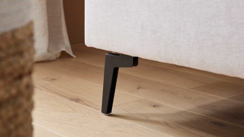 Polsterhocker Interliving aus Stoff in Weiß Interliving Sofa Serie 4450 - XL-Polsterhocker ecrufarbener Webstoff LongLife Easy & schwarze Metallfüße - ca. 86 x 64 cm