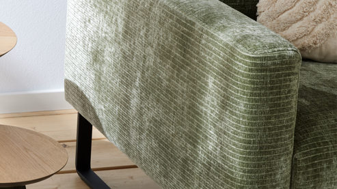 Ecksofa Roomio® aus Stoff in Grün Roomio® No. 4105 - Ecksofa schildkrötenfarbener Bezug Monty & schwarze Kufenfüße 256 MK - Stellfläche ca. 278 x 221 cm