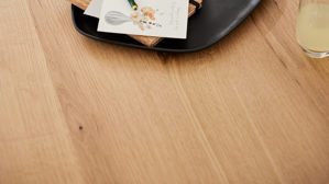 Couchtisch Roomio® aus Holz in Holzfarben Roomio Couchtisch No. 2002 Eichefurnier & schwarzes Mangoholz - ca. 173 x 104 cm